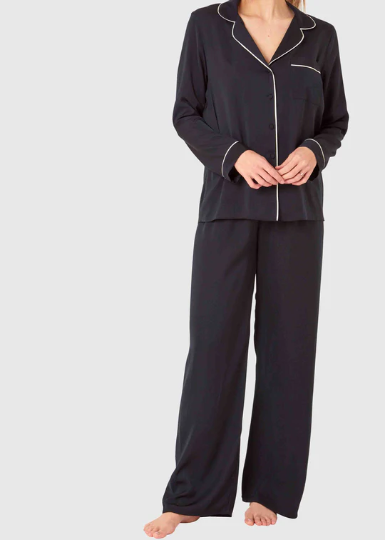 Classic black pjs with white pipping and with velcro fastening